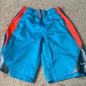 Nike blue and orange basketball shorts